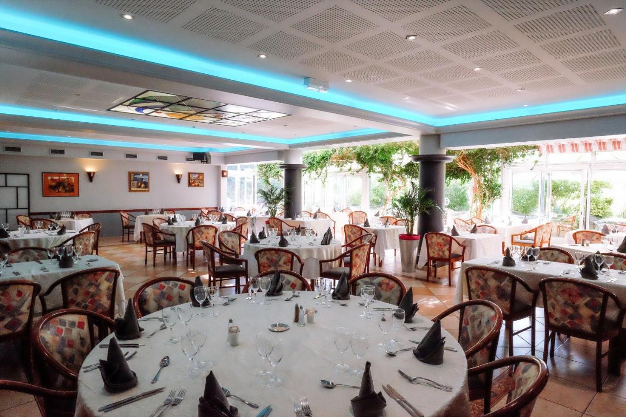 Logis Hotels - Hotel Restaurant L Enclos Donneville ภายนอก รูปภาพ