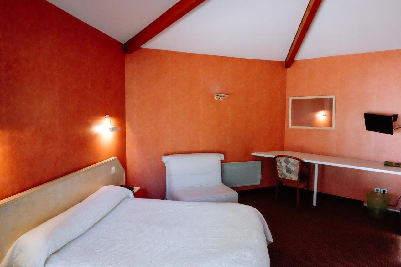 Logis Hotels - Hotel Restaurant L Enclos Donneville ภายนอก รูปภาพ