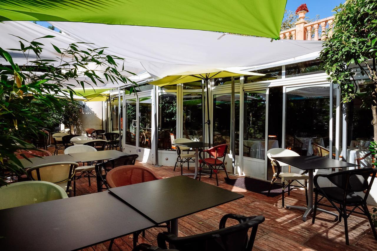Logis Hotels - Hotel Restaurant L Enclos Donneville ภายนอก รูปภาพ